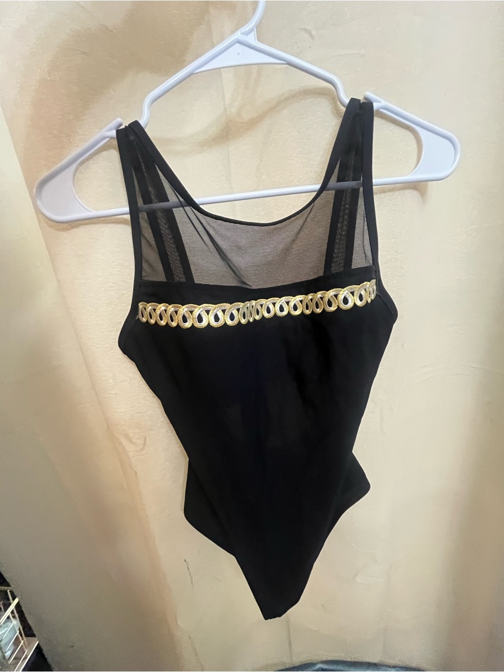Black Mesh-Accent Bodysuit with Gold Trim